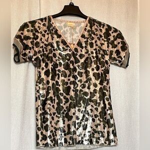 Monoplaza NWT Leo metallic leopard top